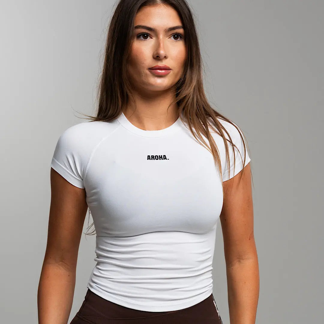 Sleek Baby Tee. - White AROHA.
