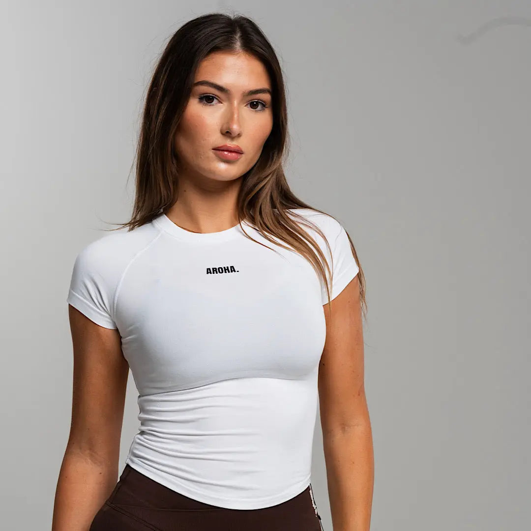 Sleek Baby Tee. - White AROHA.