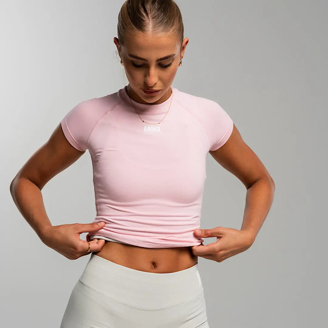 Sleek Baby Tee. - Cherry Blossom AROHA.