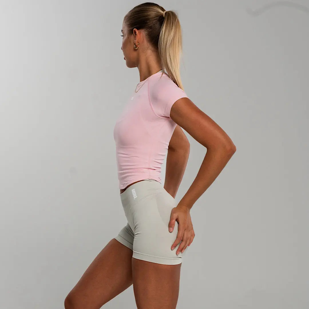 Sleek Baby Tee. - Cherry Blossom AROHA.