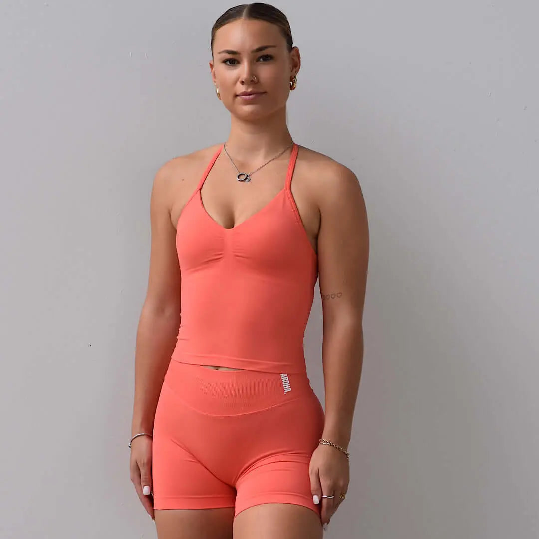 Kaia 2.0 Longline Singlet - Peach Salmon AROHA.