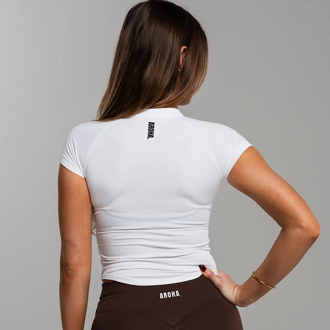 Sleek Baby Tee. - White AROHA.